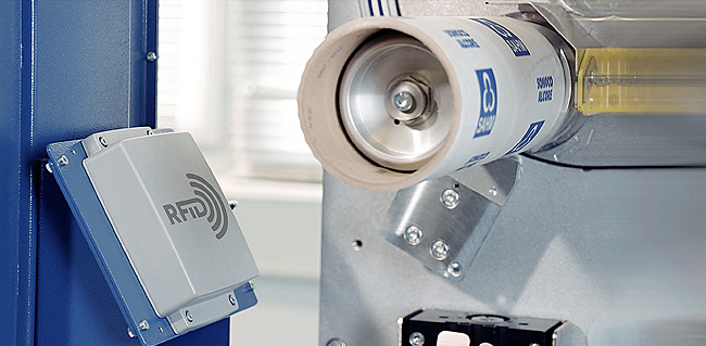 IntelliTexCORE RFID Detail photo of a SAHM machine with textile tube identification technology